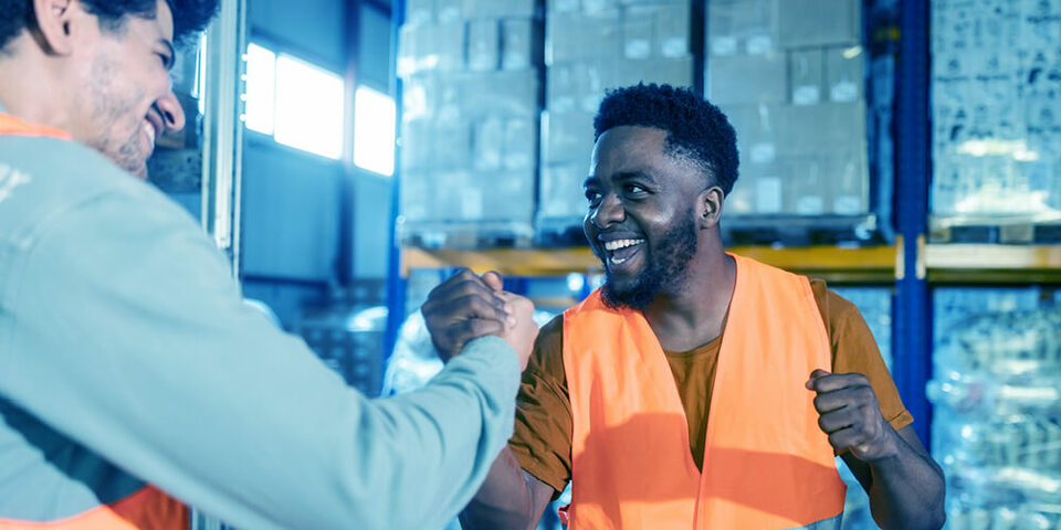 Workers celebrating a job well done