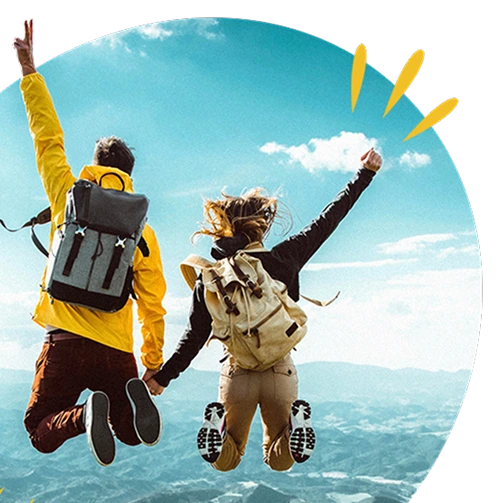 Two people holding hands and jumping excitedly