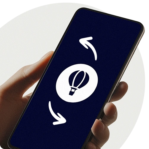 Hand holding a smartphone displaying the Perkbox hot air balloon logo with rotating arrows, symbolising employee perk redemption or reward exchange.