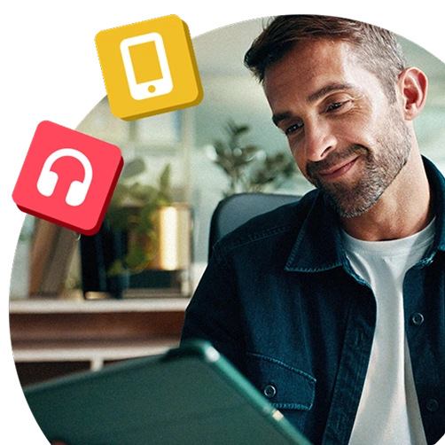 Person smiling while using a tablet, surrounded by icons of a smartphone and headphones.