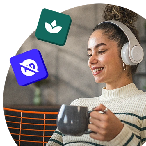 Relaxed person wearing headphones and holding a mug, enjoying uninterrupted, ad-free wellbeing content.
