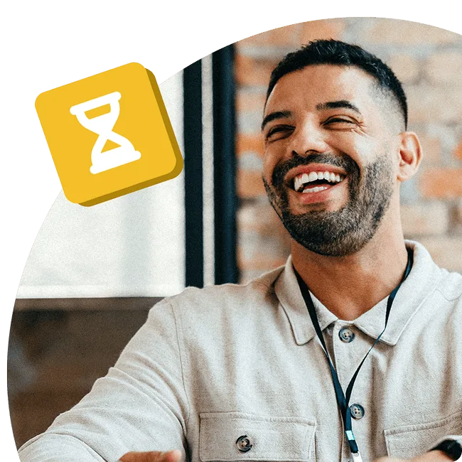 Excited person next to a yellow hourglass icon symbolising time off or flexible working.