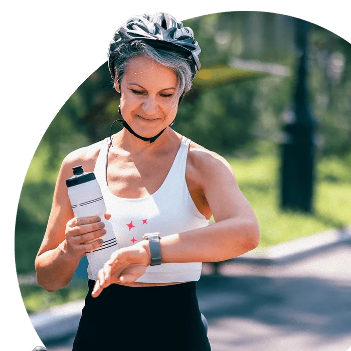 Person in activewear and a bike helmet checking her smartwatch while holding a water bottle, surrounded by wellness icons.