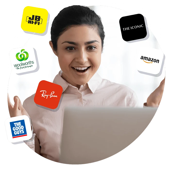 Smiling employee at laptop surrounded by brand logos like Amazon, Just Eat, and Starbucks, representing employee rewards and discount perks.