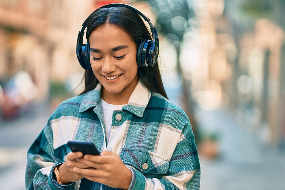 Someone on their mobile phone using Perkbox