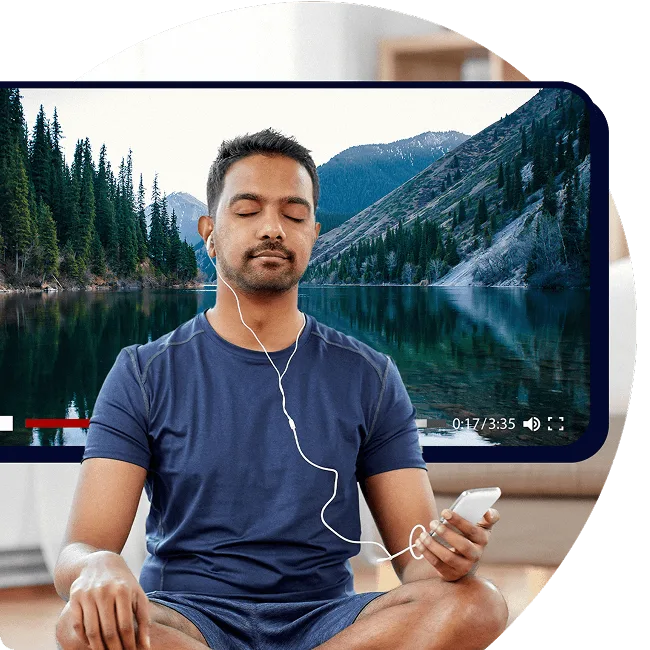 person doing yoga with wellness hub