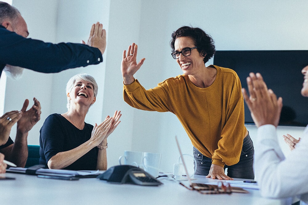 People celebrating in the office