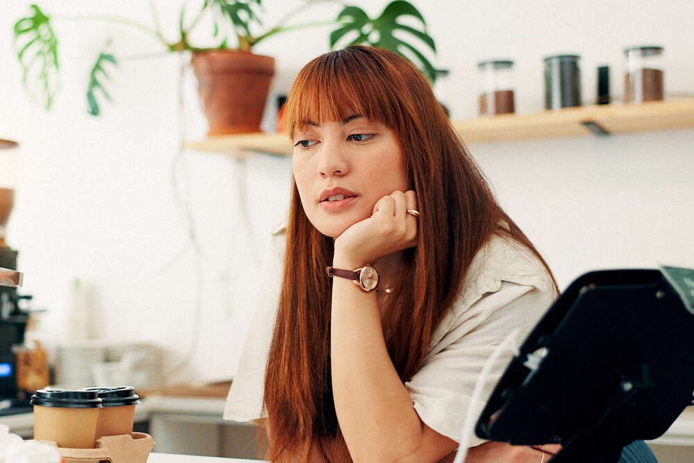 Someone looking like they don’t want to be at work