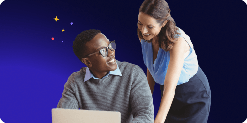 Two colleagues working together at a laptop