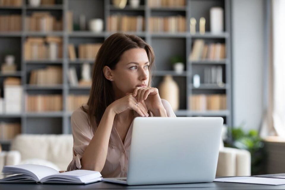 HR looking person looking pensive and thinking