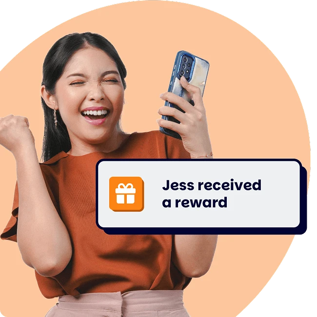 Woman on phone celebrating getting a reward at work.